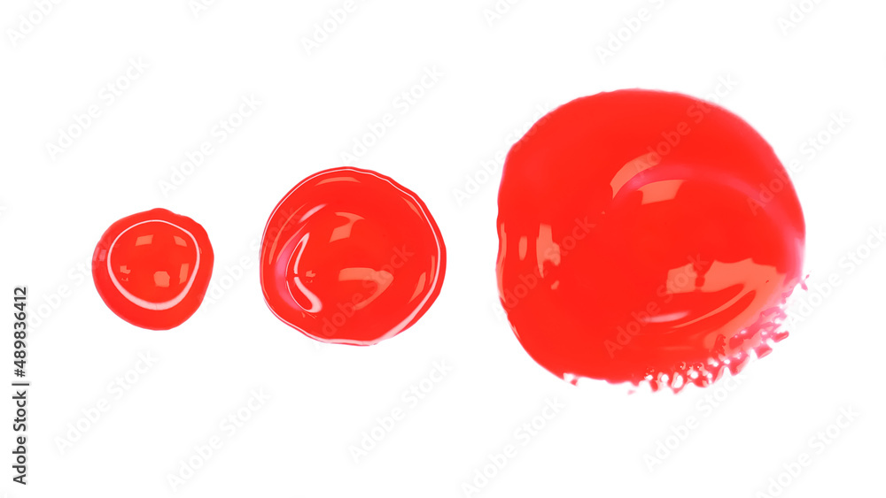 red drops of nail polish on white background red drops of nail polish on white background