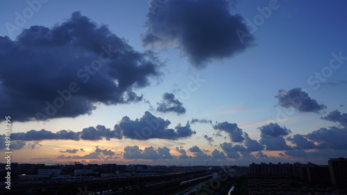 The beautiful sunset view with the colorful clouds and sky in the city