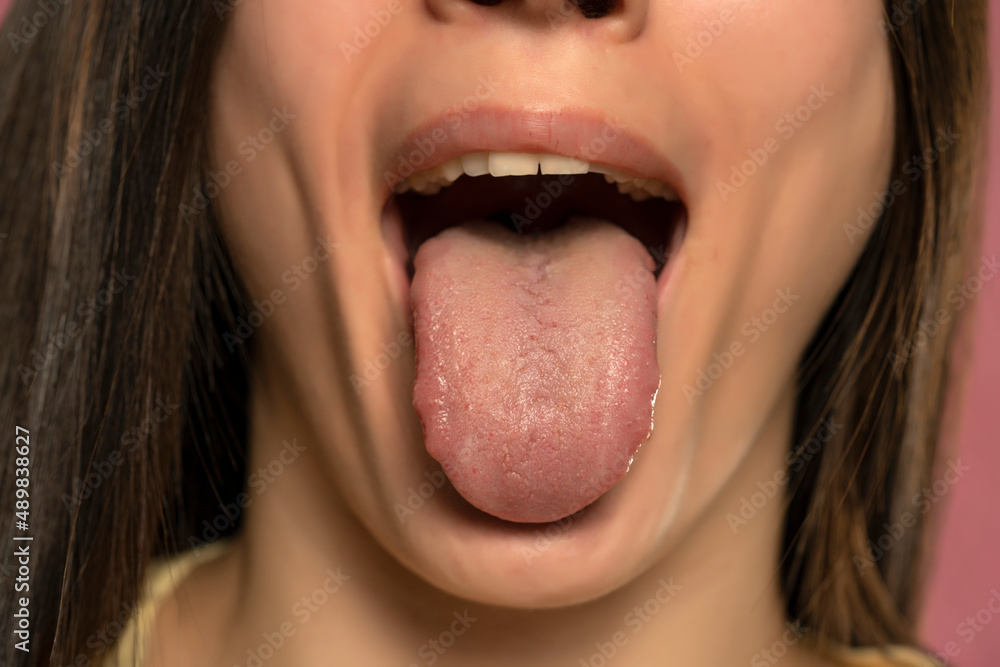 Front view of a woman tongue Front view of a woman tongue