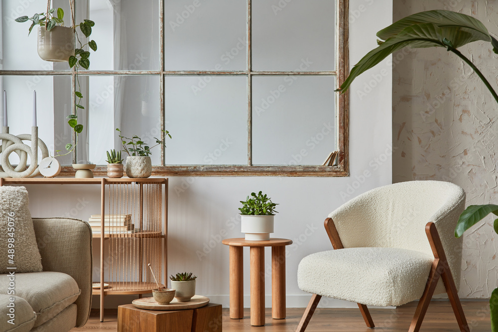 Stylish compositon of modern living room interior with frotte armchair