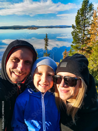 A family on the White Sea coast on a sunny day. Karelia. Russia. SEPTEMBER 2021