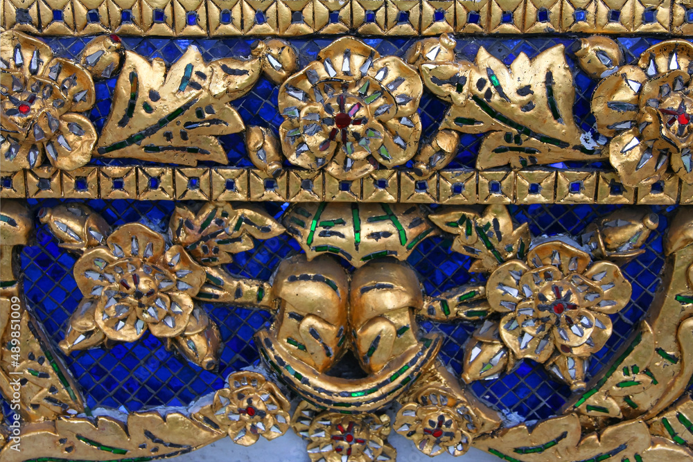 Golden Pattern at Wat Pho in Bangkok, Thailand with Floral Design of shapes and color. Vintage thai golden pattern with gems. Asian golden ornament in Thailand. Traditional decorative background Golden Pattern at Wat Pho in Bangkok, Thailand with Floral Design of shapes and color. Vintage thai golden pattern with gems. Asian golden ornament in Thailand. Traditional decorative background
