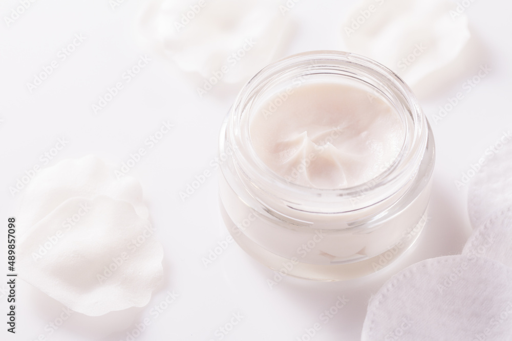 Open container with skin and body cream Open container with skin and body cream