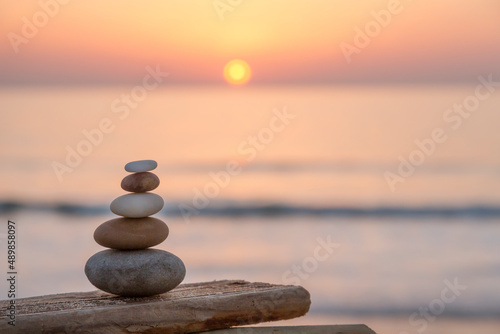Stone Cairn At Seaside Sunset