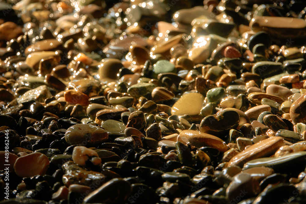 Obraz premium Sea pebbles. Small stones texture. Color stone in abstract background.