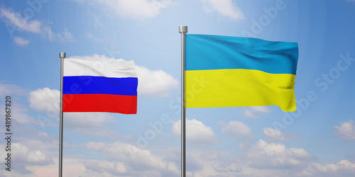 Ukraine and Russia two flags on flagpoles and blue sky