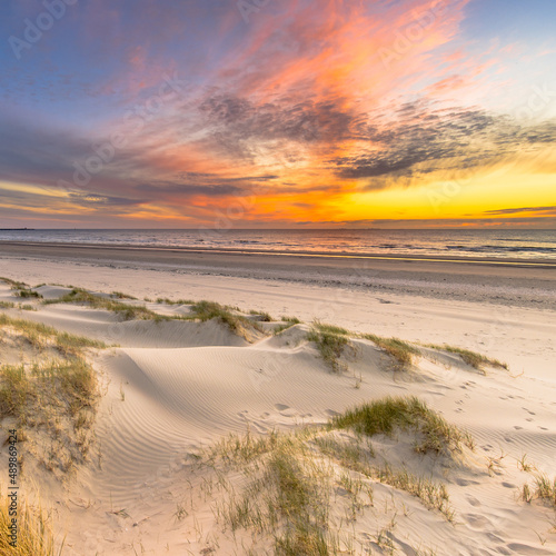 Beach and dunes colorful sunset