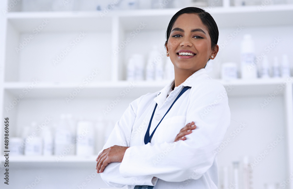 Im all about that science life. Cropped portrait of an attractive young female scientist standing with her arms folded in the lab. Im all about that science life. Cropped portrait of an attractive young female scientist standing with her arms folded in the lab.