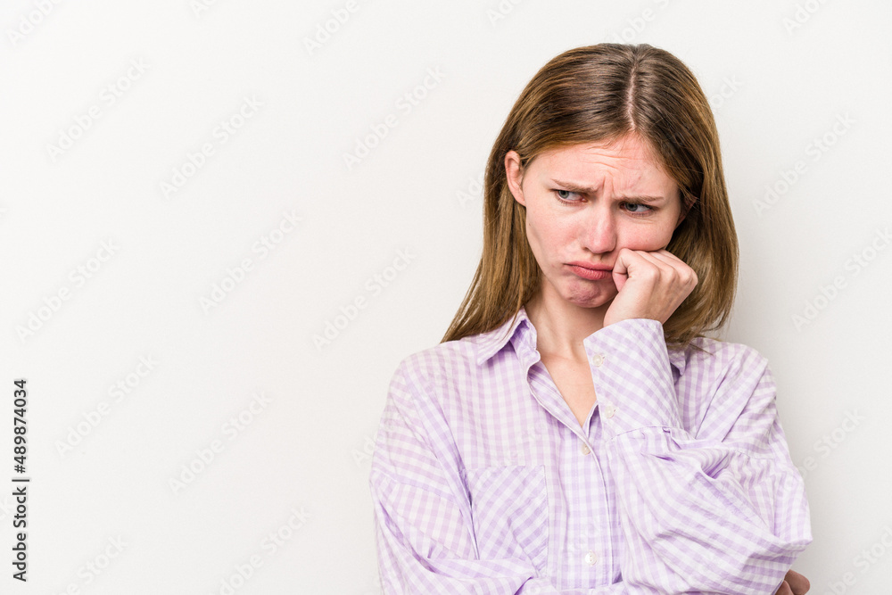 Young russian woman isolated on white background who feels sad and pensive, looking at copy space. Young russian woman isolated on white background who feels sad and pensive, looking at copy space.