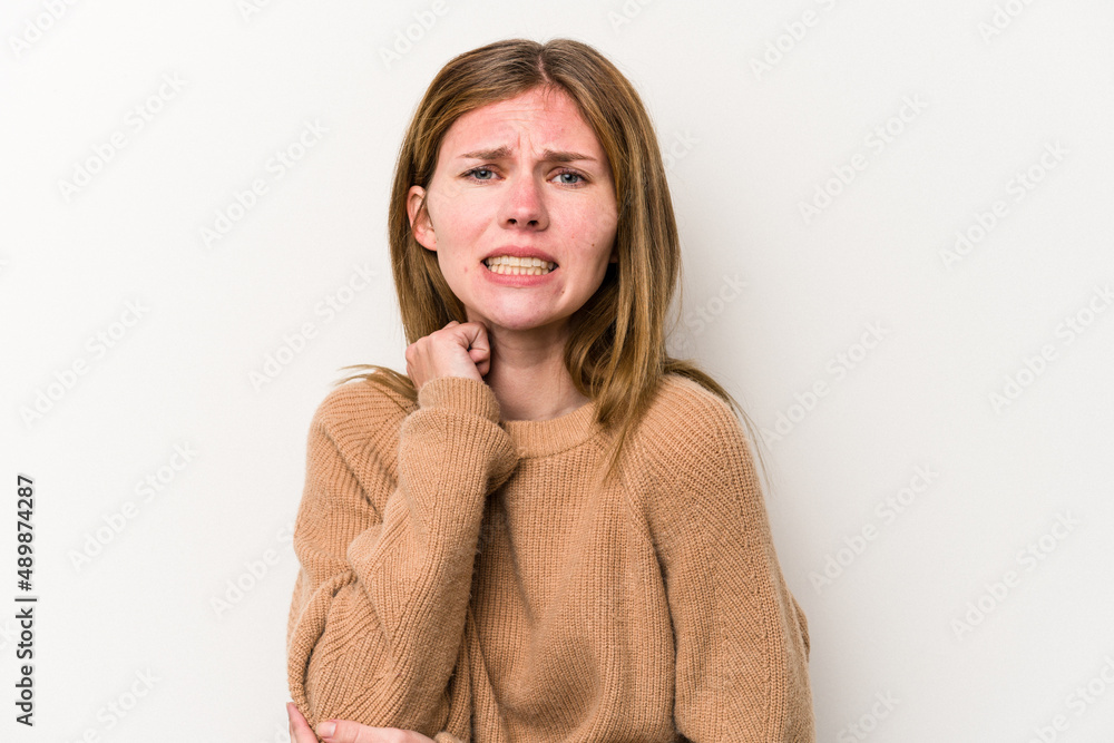 Young russian woman isolated on white background massaging elbow, suffering after a bad movement. Young russian woman isolated on white background massaging elbow, suffering after a bad movement.
