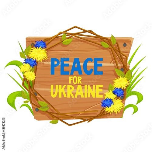 Text Peace for Ukraine on wooden frame with flowers in national colors of Ukrainiann flag. Support concept, banner. photo