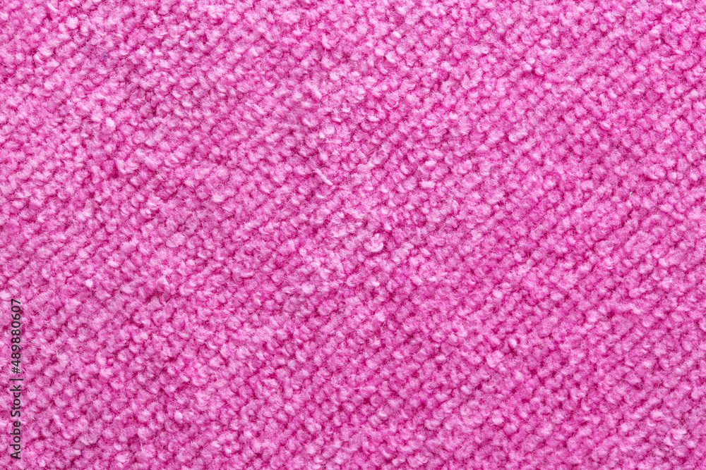 Fototapeta premium Pink terry towel, background, close-up. Handmade, textile