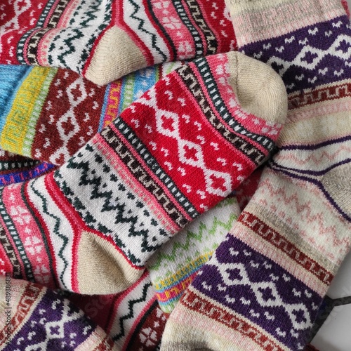 View from above on hand-knitted colorful Norwegian socks