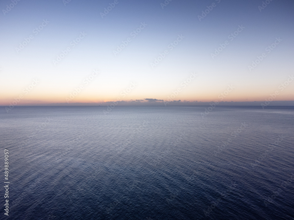 sunrise over the sea on a calm relaxing morning in spain sunrise over the sea on a calm relaxing morning in spain
