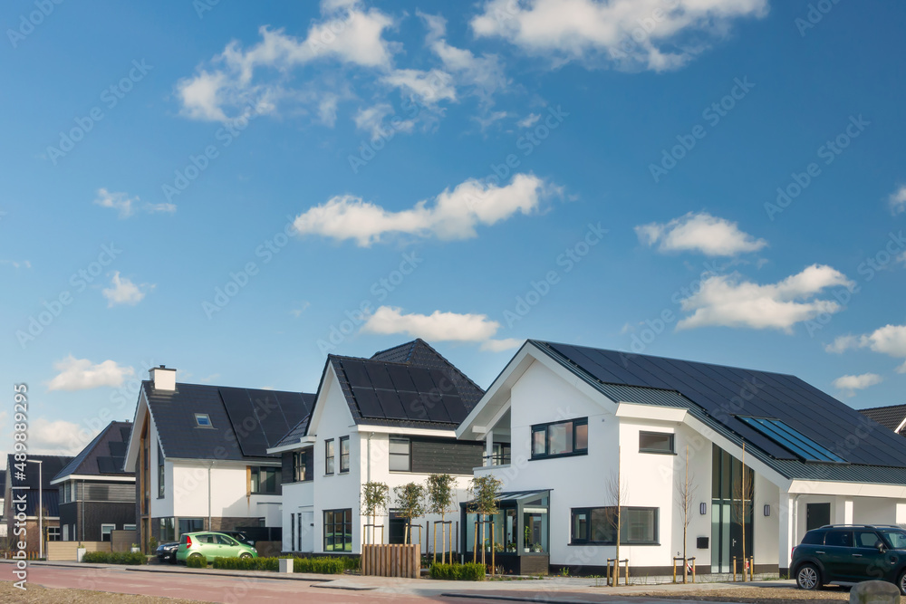 Dutch new luxury detached white family homes with solar panels Dutch new luxury detached white family homes with solar panels