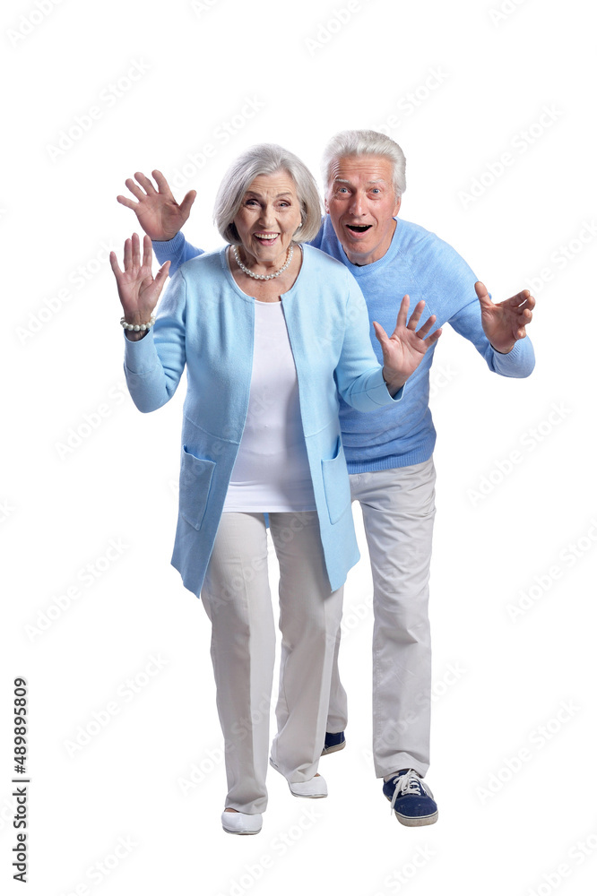 Portrait of happy beautiful senior couple posing isolated on white background Portrait of happy beautiful senior couple posing isolated on white background
