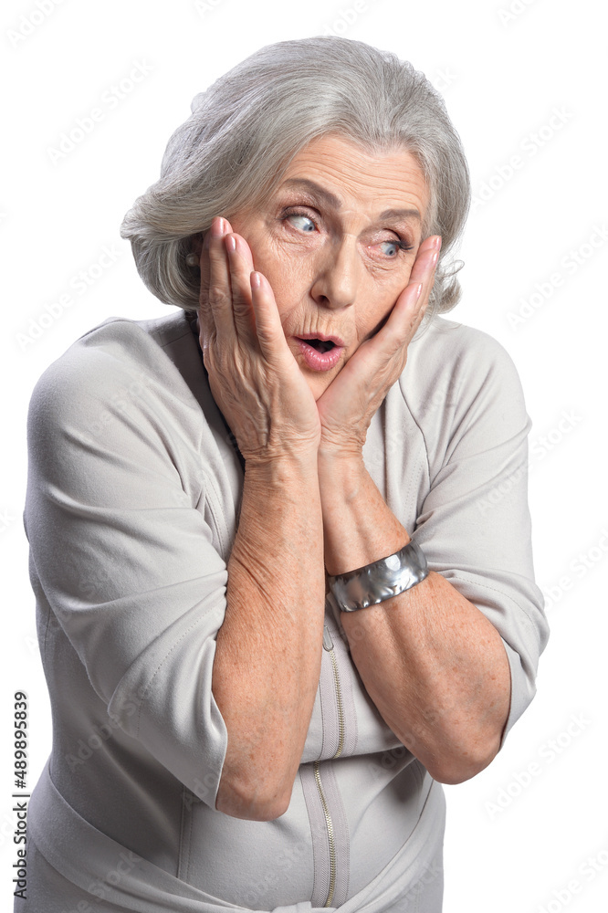 Portrait of happy senior woman posing isolated on white background Portrait of happy senior woman posing isolated on white background