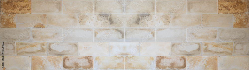 Beige brown travertine natural stone tiles wall texture background banner panorama Beige brown travertine natural stone tiles wall texture background banner panorama