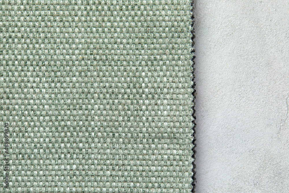 Fototapeta premium Masterly fabric background in new olive colour. Seamless square texture, tile ready