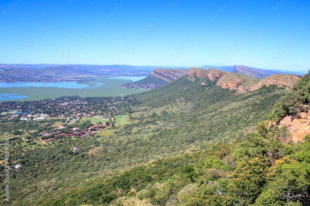 Hartbeespoort Dam surrounded by urban area,  Magaliesberg mountain, North West Province, South Africa