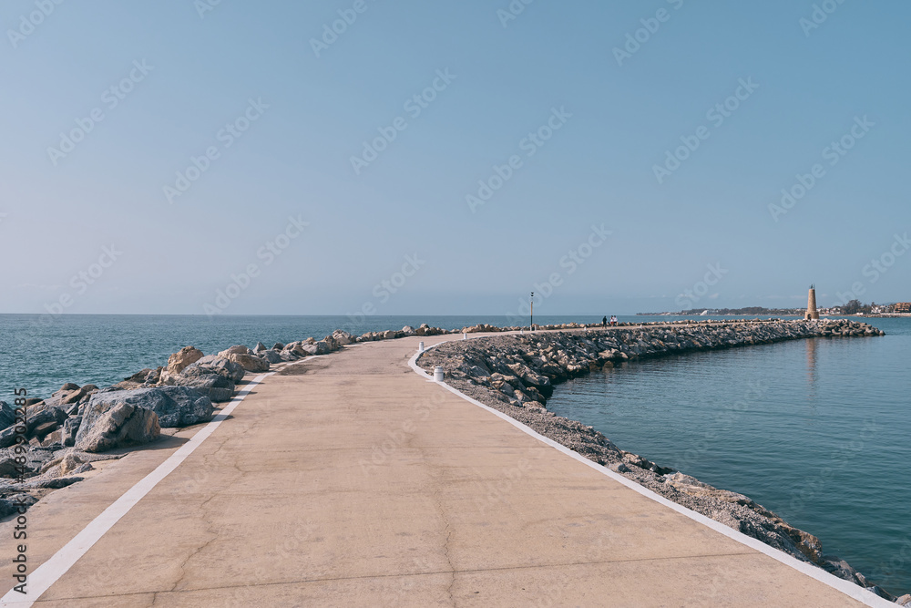 Harbor entrance with the watchtower to the left and La Concha mountain to the rear, Puerto Banus, Marbella, Costa del Sol, Malaga Province, Andalucia, Spain, Western Europe.