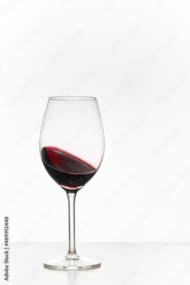 Glass of red wine isolated on white Glass of red wine isolated on white