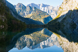 The Watzmann massif is reflected in the Obersee