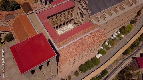 Drone shot of Mount Montserrat. Drone view of the famous monastery. Mountain shelter of Benedictine monks. The jagged mountains of Spain. Mountain trails. Barcelona Summer. High quality 4k footage