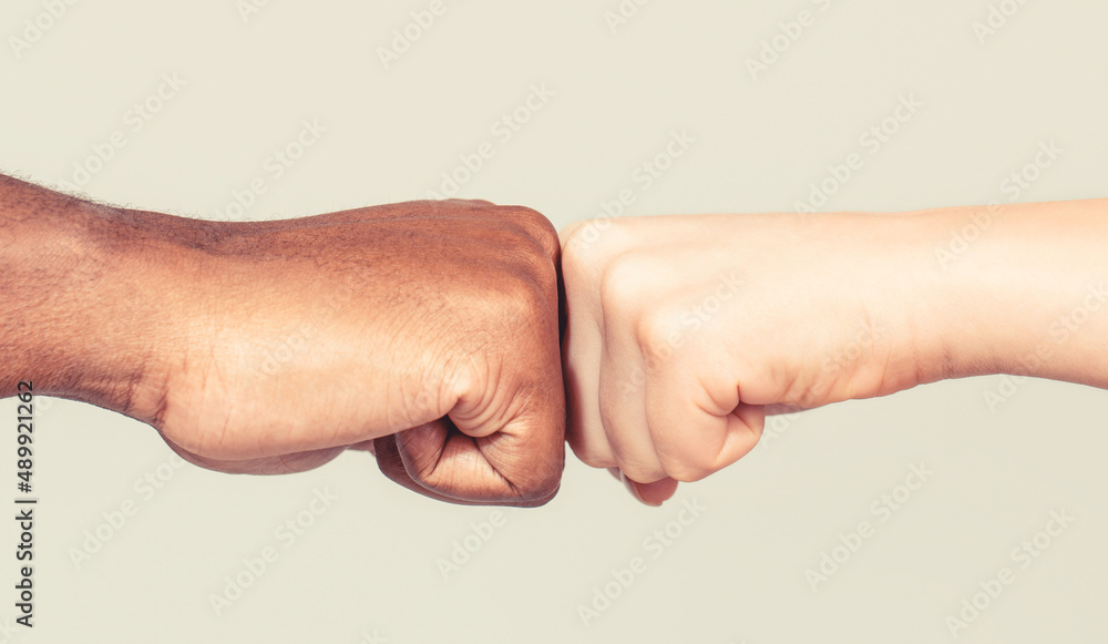 Black African American race male and woman hands giving a fist bump ...