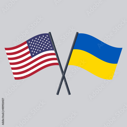 US and Ukraine flag on stick crossed. The United States of America vector icon flat design.