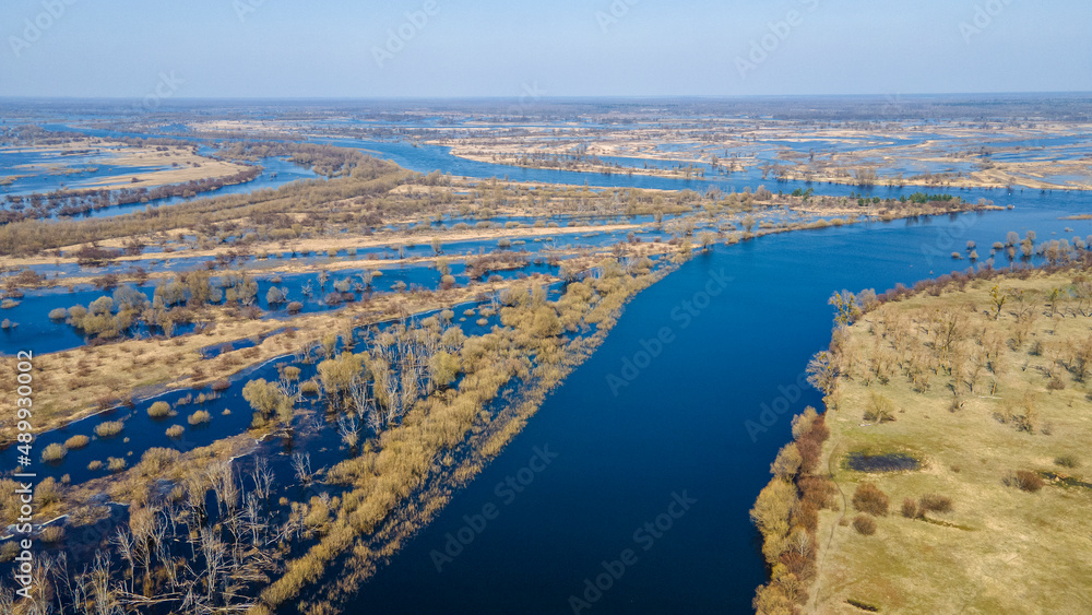 Aerial view flooded forest and fields. The high waters flooded a big area of farm land.