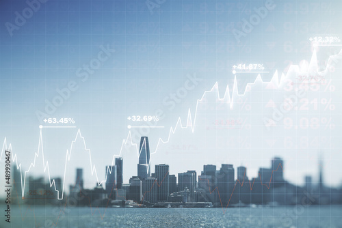 Abstract virtual financial graph hologram on San Francisco cityscape background  financial and trading concept. Multiexposure