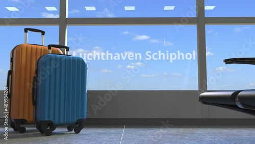 Terminal and commercial airplane revealing Luchthaven schiphol text photo