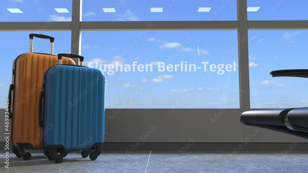 Terminal and commercial airplane revealing Flughafen Berlin-Tegel text Terminal and commercial airplane revealing Flughafen Berlin-Tegel text
