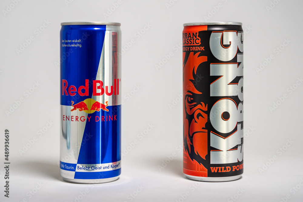 DRESDEN, GERMANY 27. February 2022: Red Bull energy drink versus Lidl store brand Kong Strong. Beverages with sugar as in supermarket. Cheap to the famous brand. Stock-foto | Adobe Stock