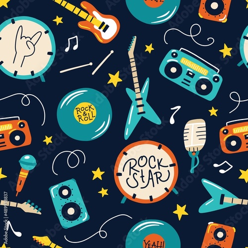 Retro musical rock instruments seamless pattern. Hand drawn colorful illustrations of guitars, drums, tape recorders in simple doodle cartoon childish style. for baby textiles, wallpaper, wrapping.