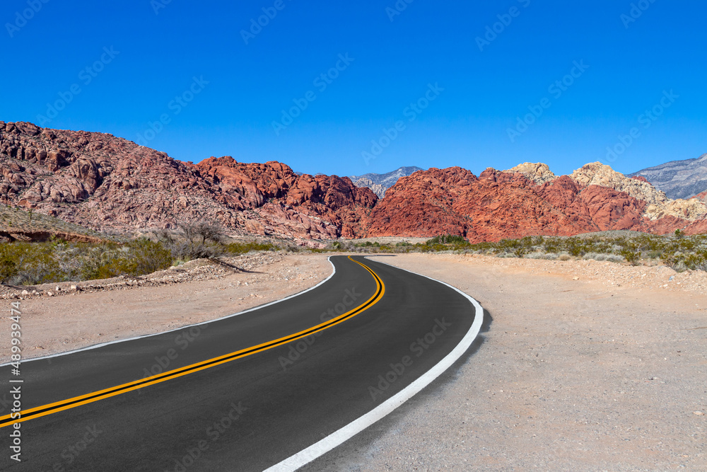 A curved road in the Red Rock Canyon National Conservation Area in Nevada A curved road in the Red Rock Canyon National Conservation Area in Nevada
