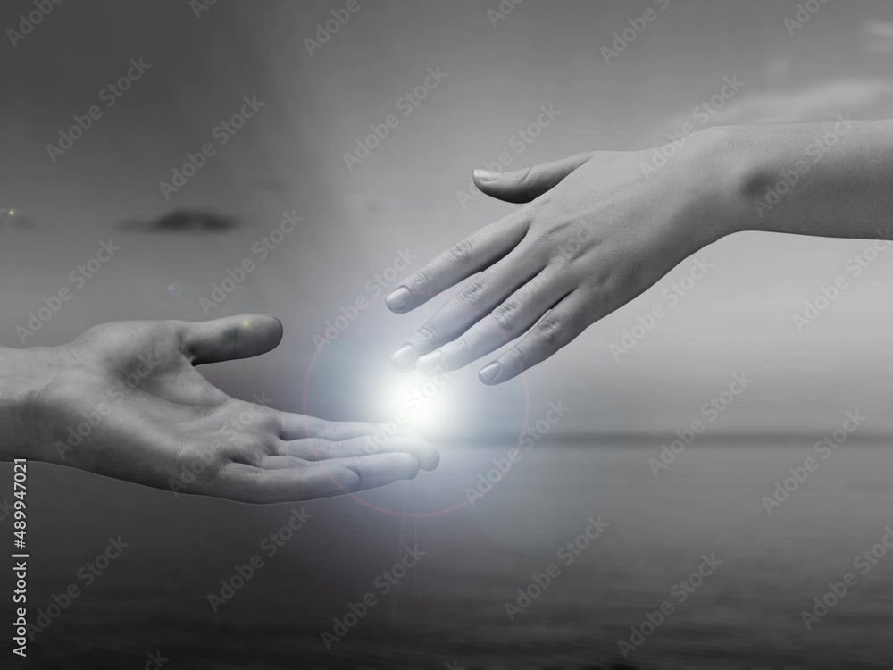Inspirational quote concept. With helping hands touch the light ...