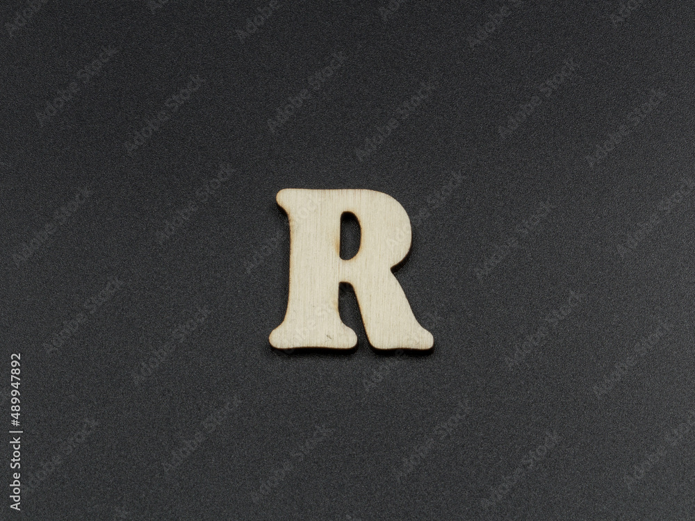 The letter R on a black background. The letter R on a black background.
