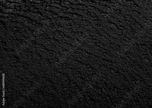 Black color leather texture background. Luxury Black Background For Text. Close up detail of flat leather. Artificial leather seamless pattern. Natural luxury of cow skin leather texture surface.