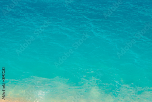 Turquoise sea background photo. Abstract background of calm sea