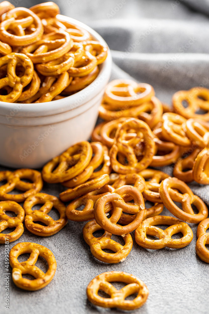 Mini pretzels. Crusty salted snack on kitchen table. Mini pretzels. Crusty salted snack on kitchen table.