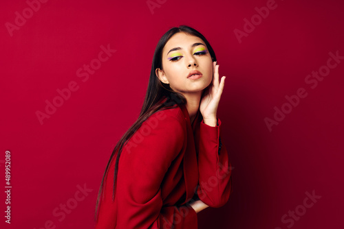 attractive girl fashion posing in red jacket isolated background unaltered