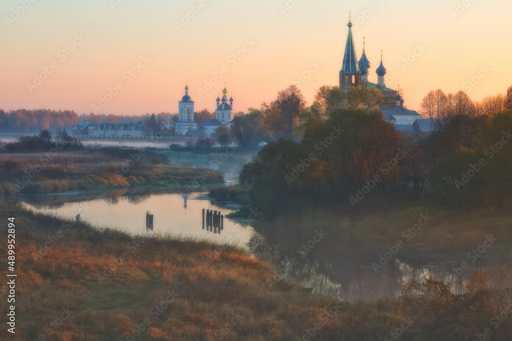 old churches at sunrise in Dunilovo, Russia