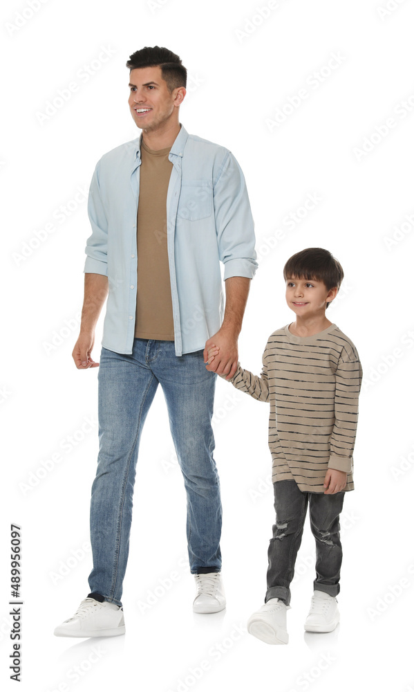 Little boy with his father on white background Little boy with his father on white background