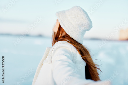 young woman winter clothes walk snow cold vacation travel