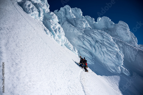 Mountaineers out on a ledge above Hogsback on Mount Hood