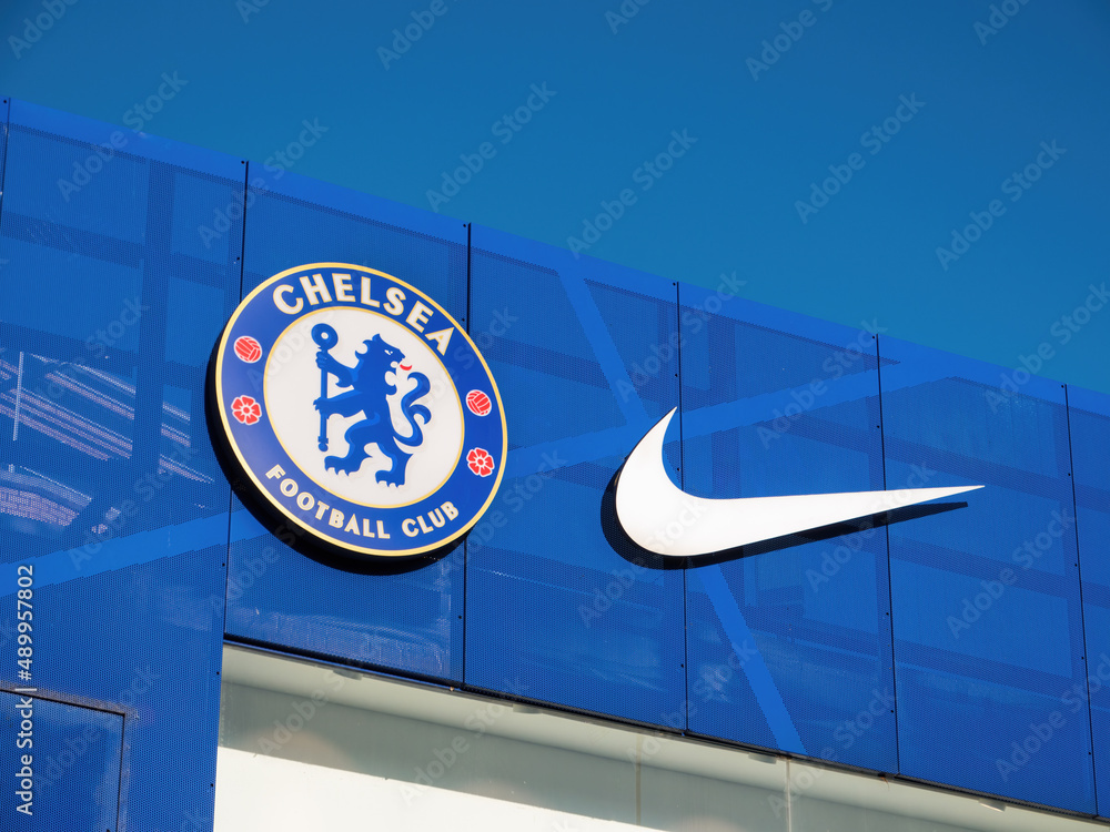 London, England, February 27th 2022: Chelsea football club and Nike logo on  a wall at Stamford