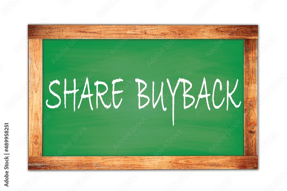 SHARE BUYBACK text written on green school board. SHARE BUYBACK text written on green school board.