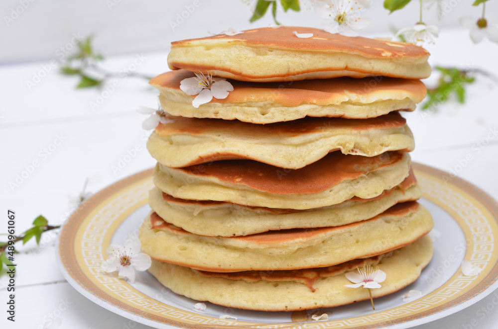 stack of fluffy pancakes in a plate close-up stack of fluffy pancakes in a plate close-up